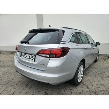 Opel Astra  Kombi 2016,  1.6 diesel - Na sprzedaż za 37 641 zł - Rybnik - zdjęcie 4