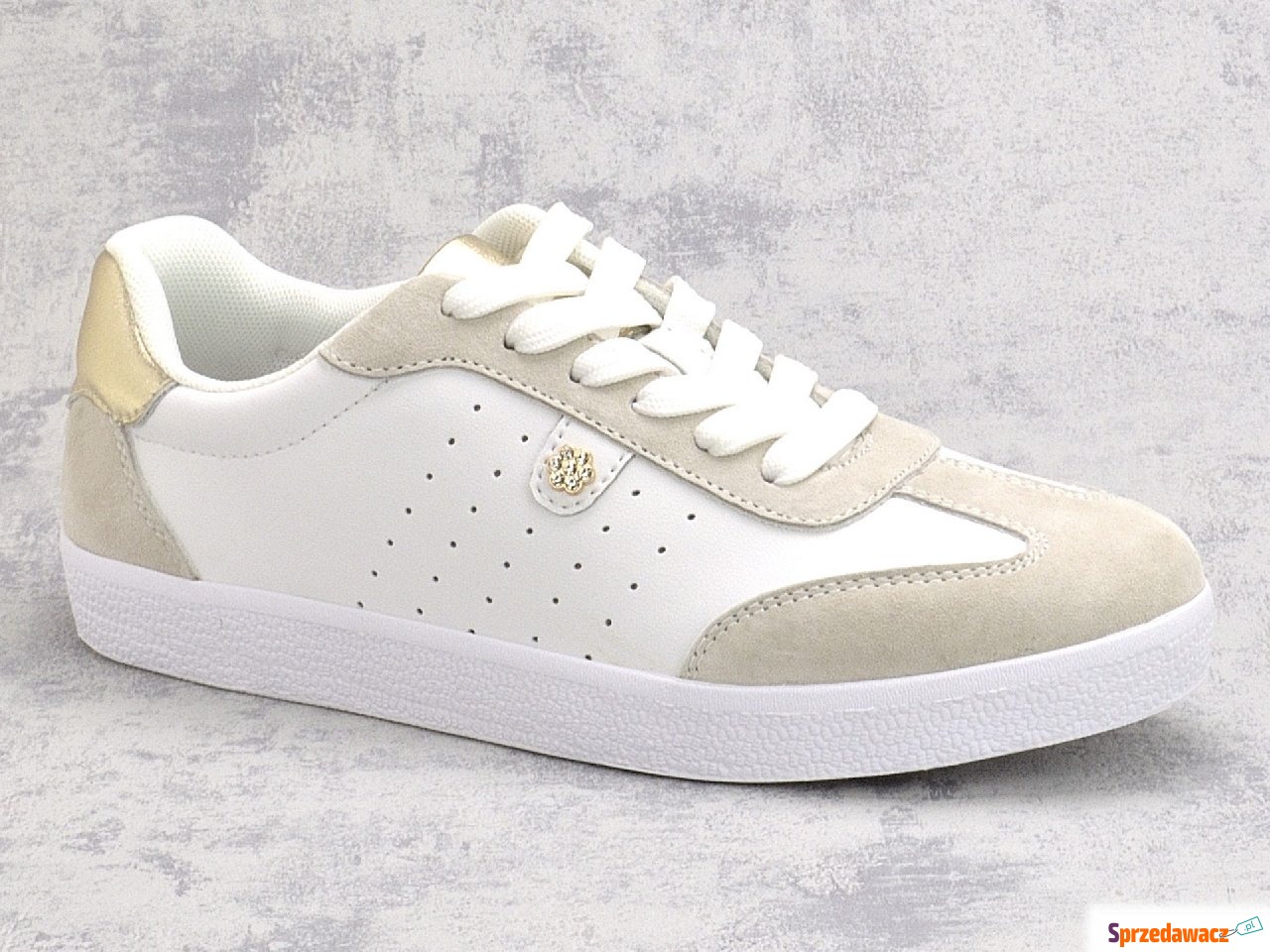 Białe skórzane sneakersy damskie...
