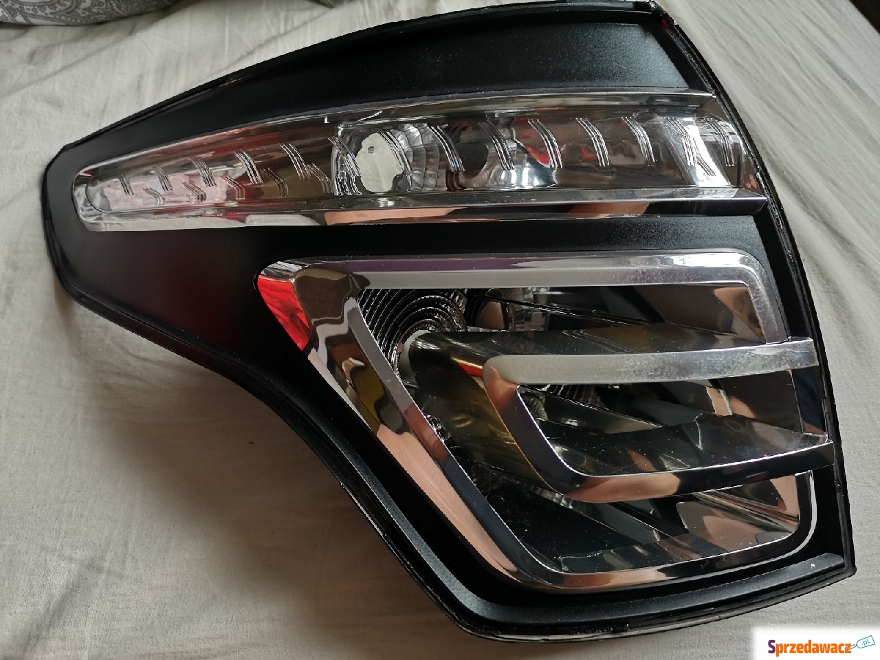 Obudowa mocowania lampa lewa tył...