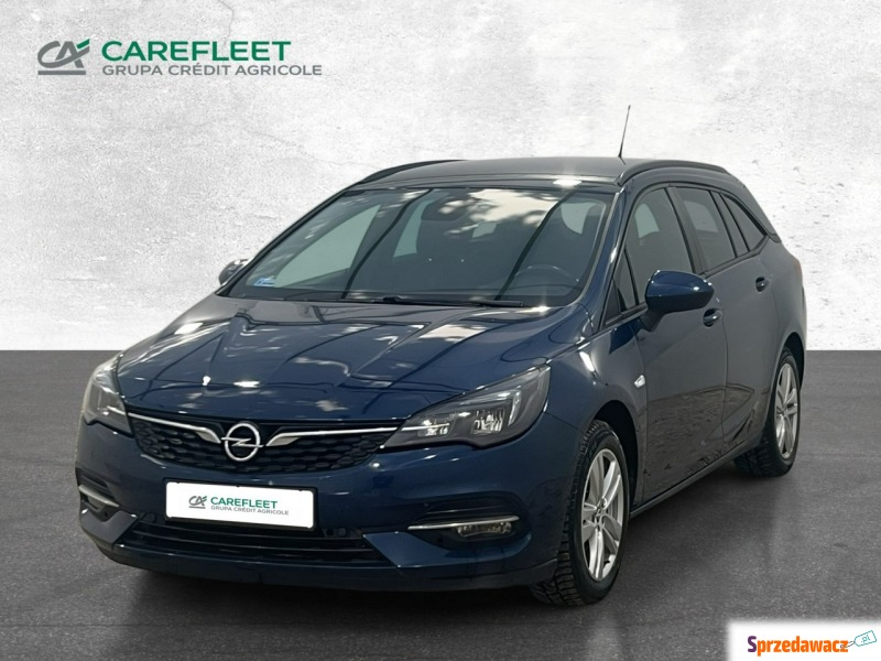 Opel Astra  Kombi 2021,  1.2 benzyna - Na sprzedaż za 35 000 zł - Warszawa