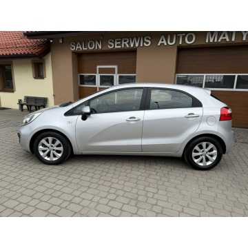 Kia Rio  Hatchback 2012,  1.2 benzyna - Na sprzedaż za 22 900 zł - Orzech - zdjęcie 10
