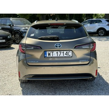Toyota Corolla  Kombi 2020,  1.8 hybryda, automat - Na sprzedaż za 76 900 zł - Pęcice - zdjęcie 4