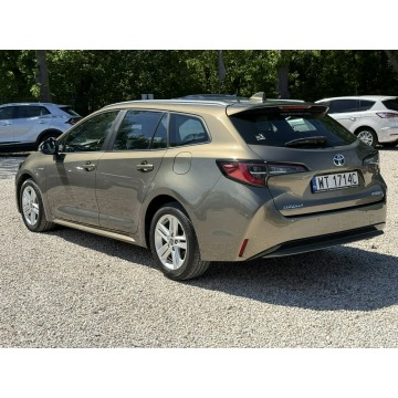 Toyota Corolla  Kombi 2020,  1.8 hybryda, automat - Na sprzedaż za 76 900 zł - Pęcice - zdjęcie 5