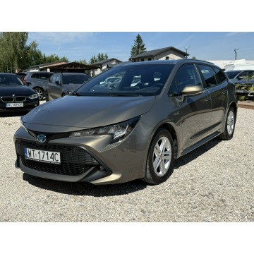 Toyota Corolla  Kombi 2020,  1.8 hybryda, automat - Na sprzedaż za 76 900 zł - Pęcice - zdjęcie 7