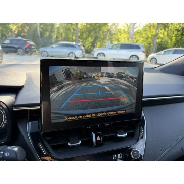 Toyota Corolla  Kombi 2023,  1.8 hybryda, automat - Na sprzedaż za 89 900 zł - Pęcice - zdjęcie 3