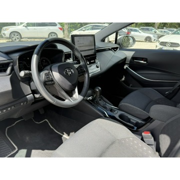 Toyota Corolla  Kombi 2023,  1.8 hybryda, automat - Na sprzedaż za 89 900 zł - Pęcice - zdjęcie 11