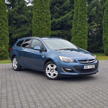 Opel Astra  Kombi 2013,  1.4 benzyna - Na sprzedaż za 22 900 zł - Ostrów Mazowiecka - zdjęcie 7