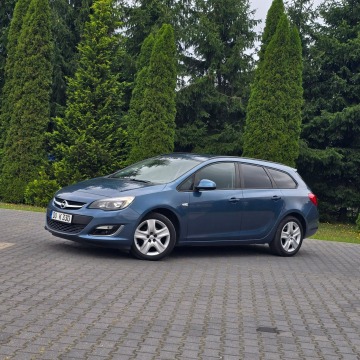 Opel Astra  Kombi 2013,  1.4 benzyna - Na sprzedaż za 22 900 zł - Ostrów Mazowiecka - zdjęcie 4