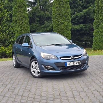 Opel Astra  Kombi 2013,  1.4 benzyna - Na sprzedaż za 22 900 zł - Ostrów Mazowiecka - zdjęcie 6