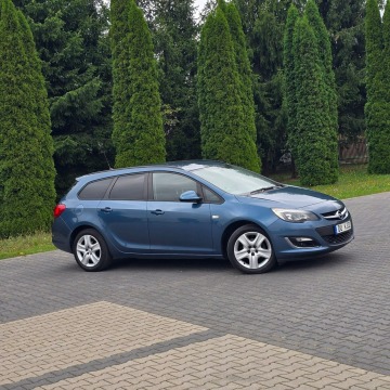 Opel Astra  Kombi 2013,  1.4 benzyna - Na sprzedaż za 22 900 zł - Ostrów Mazowiecka - zdjęcie 8