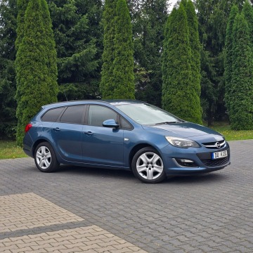 Opel Astra  Kombi 2013,  1.4 benzyna - Na sprzedaż za 22 900 zł - Ostrów Mazowiecka - zdjęcie 9