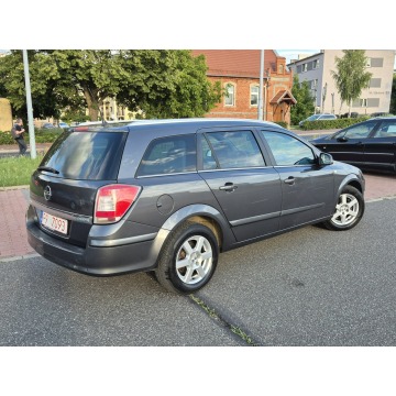 Opel Astra  Kombi 2010,  1.6 benzyna - Na sprzedaż za 12 400 zł - Zielona Łąka - zdjęcie 8
