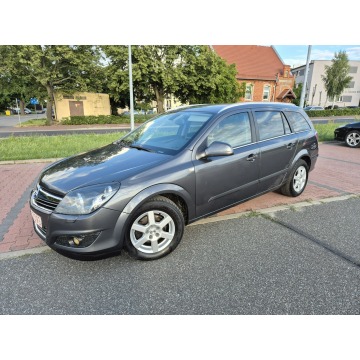 Opel Astra  Kombi 2010,  1.6 benzyna - Na sprzedaż za 12 400 zł - Zielona Łąka - zdjęcie 4