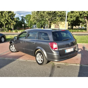 Opel Astra  Kombi 2010,  1.6 benzyna - Na sprzedaż za 12 400 zł - Zielona Łąka - zdjęcie 6