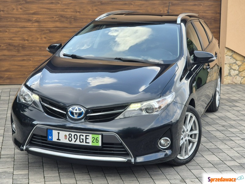 Toyota Auris  Kombi 2014,  1.8 hybryda - Na sprzedaż za 37 900 zł - Radom